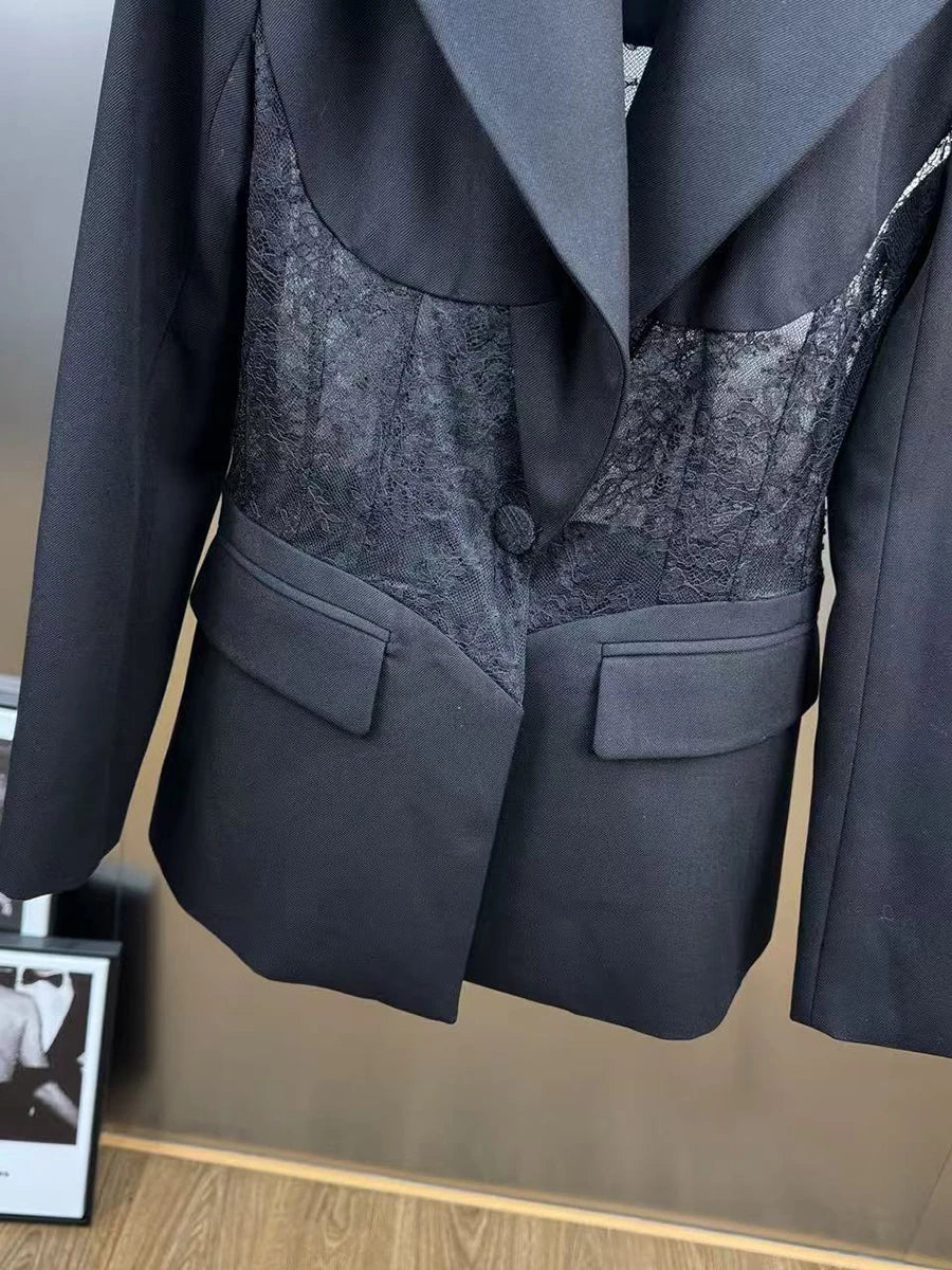Black blazer with sheer lace center panel and flap pockets
