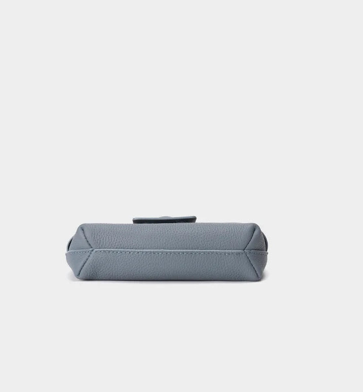 Gray cylindrical pouch on a white background