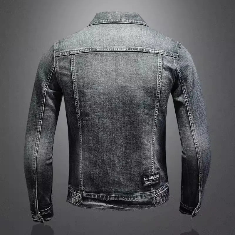 Back view of blue-gray denim motorcycle jacket with yoke seam and hem patch label