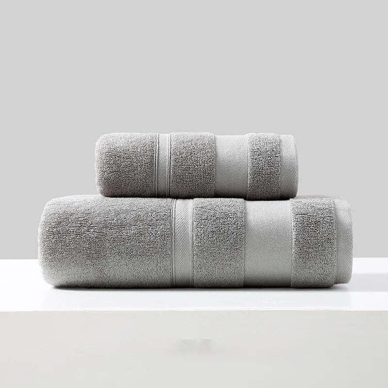 Cotton towel set of 2 in light gray, folded bath towels with stripe bands