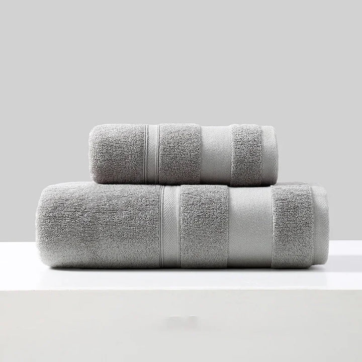 Cotton towel set of 2 in light gray, folded bath towels with stripe bands