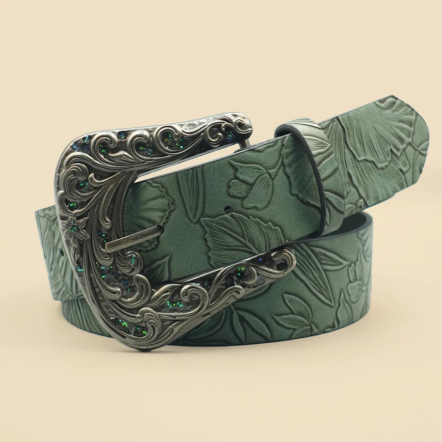 Green leaf-embossed belt with ornate silver buckle