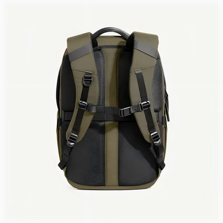 Olive green backpack with padded shoulder harness, side compression straps, and black trim