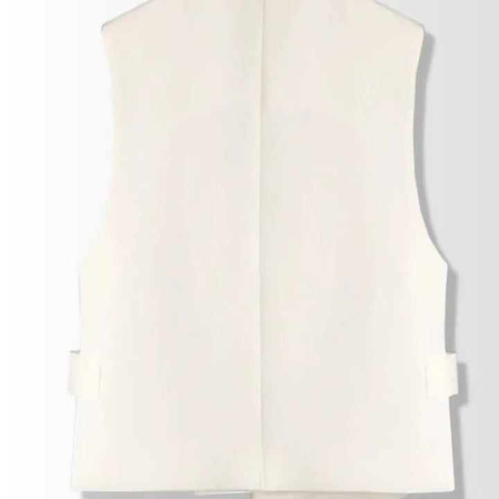 White sleeveless waistcoat back view with clean center panel and irregular hem